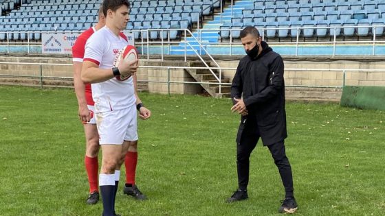 choreographer instructing sports talent on set